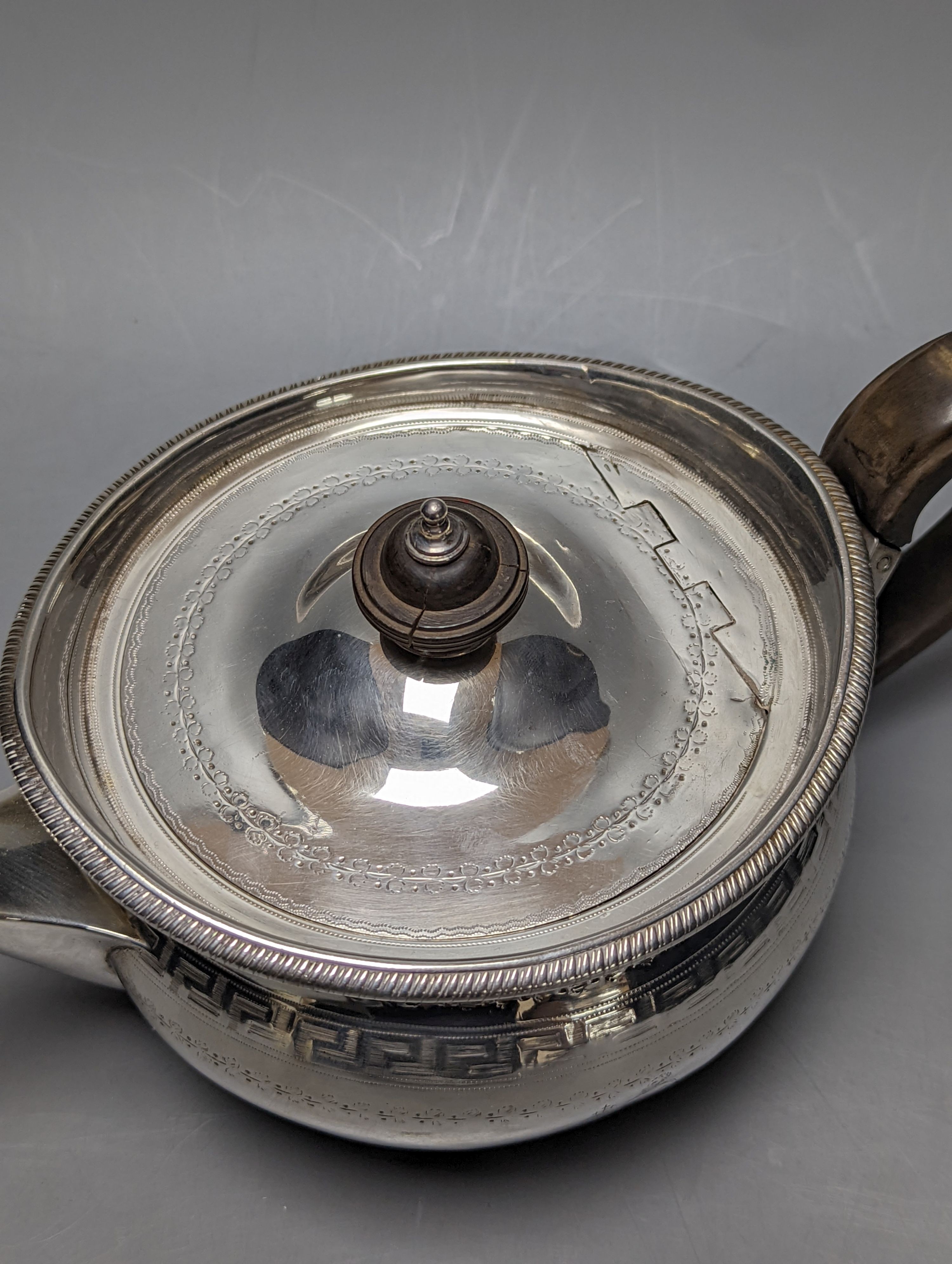 A George III engraved silver teapot, with crest, Robert & Samuel Hennell, London, 1802
